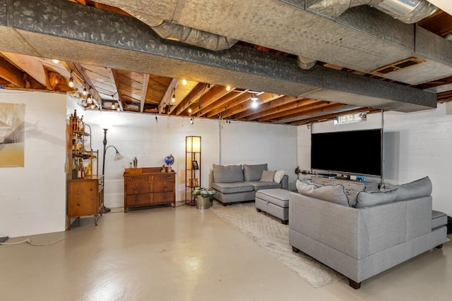 437 Collindale Ave NW, Grand Rapids, MI 49504 - living area with concrete flooring