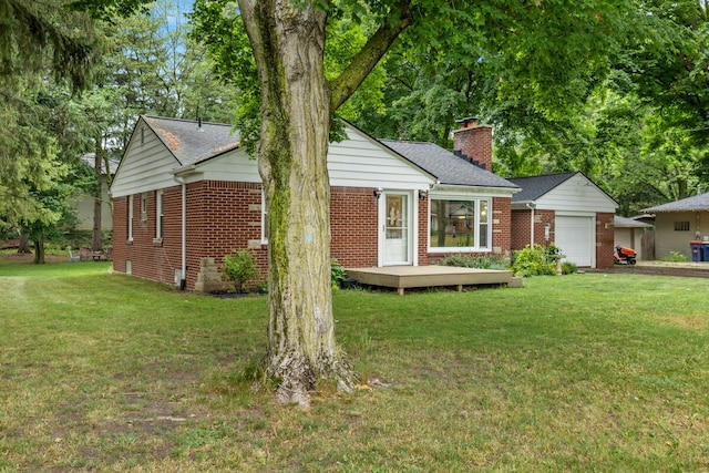 437 Collindale Ave NW, Grand Rapids, MI 49504 - ranch-style house with an attached garage, brick siding, a deck, and a chimney