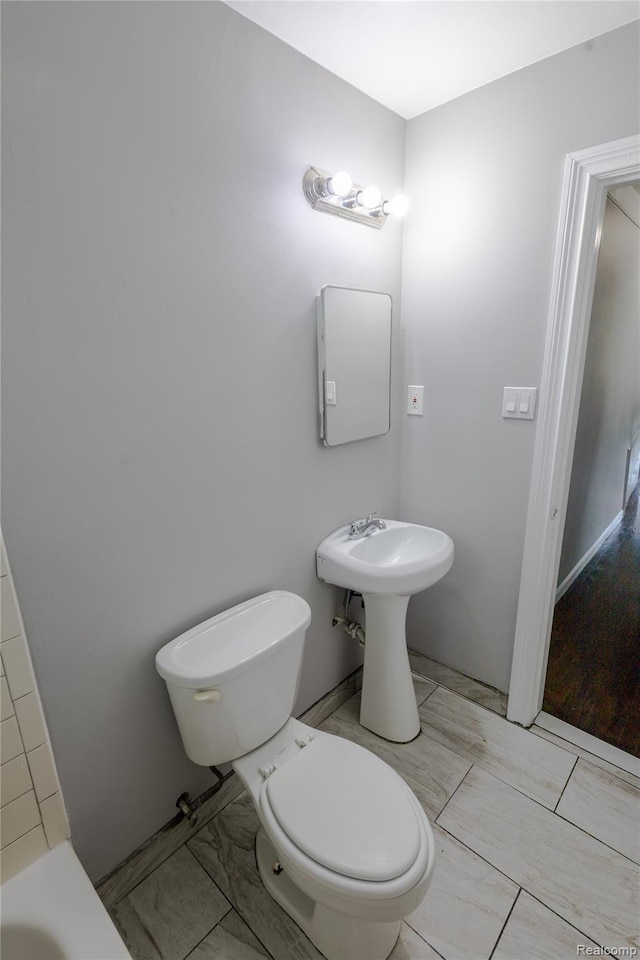 22613 Raven Ave, Eastpointe, MI 48021 - full bathroom featuring marble finish flooring and a bath