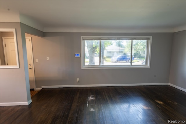 22613 Raven Ave, Eastpointe, MI 48021 - empty room with wood-type flooring and baseboards