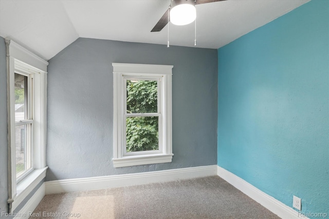 1 Grand Blvd, Battle Creek, MI 49015 - carpeted empty room featuring healthy amount of natural light, a ceiling fan, and lofted ceiling