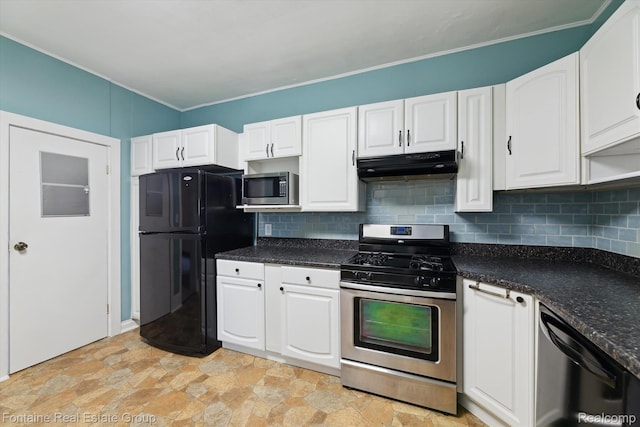 1 Grand Blvd, Battle Creek, MI 49015 - kitchen with appliances with stainless steel finishes, under cabinet range hood, white cabinets, light stone finish floors, and crown molding