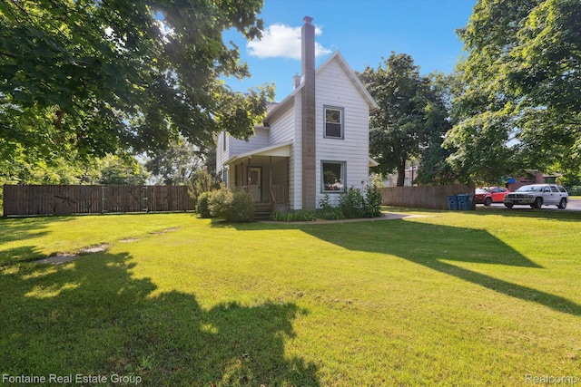 1 Grand Blvd, Battle Creek, MI 49015 - view of side of home featuring a chimney and a porch