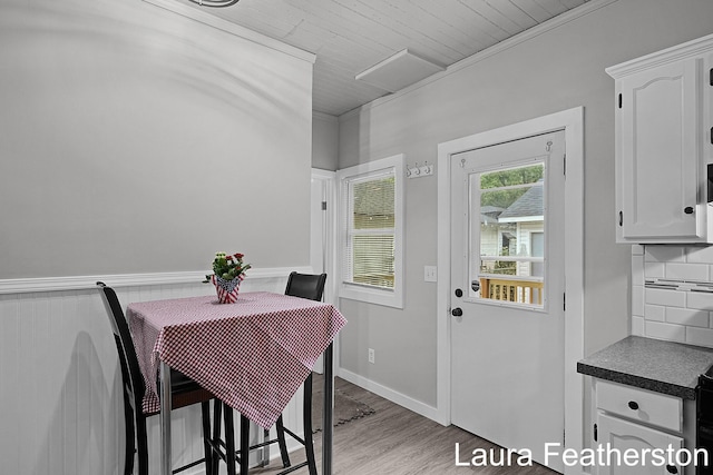1119 White Ave NW, Grand Rapids, MI 49504 - dining room with light wood-style floors