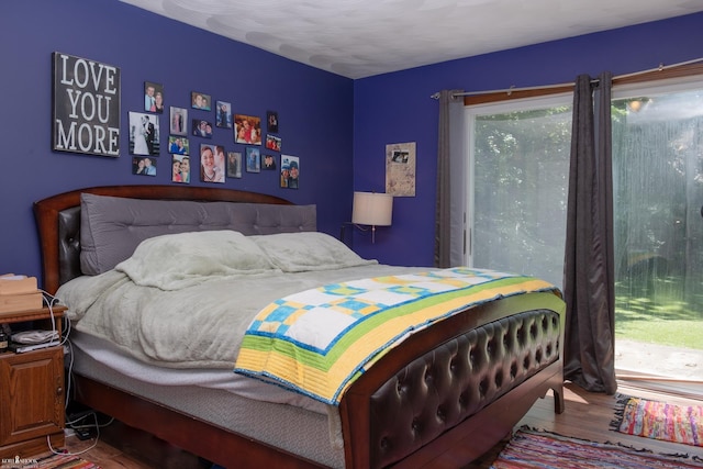 279 Ardelean Dr, Owosso, MI 48867 - bedroom featuring wood finished floors