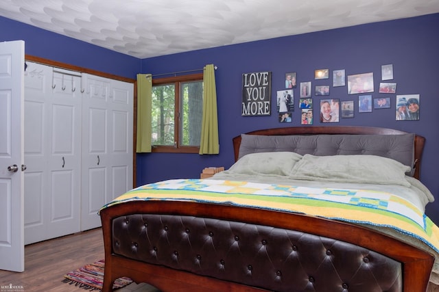 279 Ardelean Dr, Owosso, MI 48867 - bedroom featuring wood finished floors and a closet