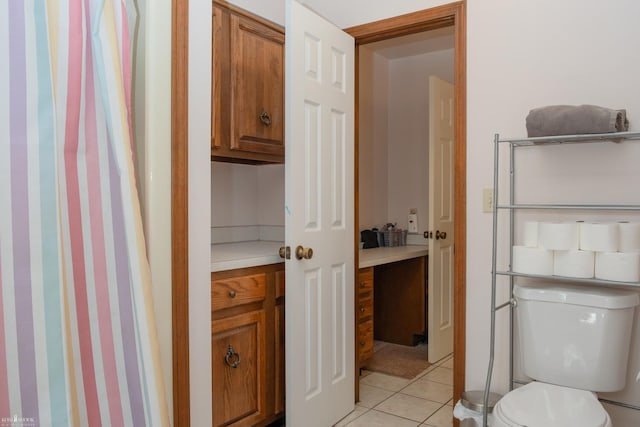 279 Ardelean Dr, Owosso, MI 48867 - bathroom with toilet and tile patterned flooring