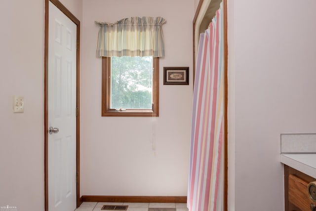 279 Ardelean Dr, Owosso, MI 48867 - bathroom featuring vanity and tile patterned flooring
