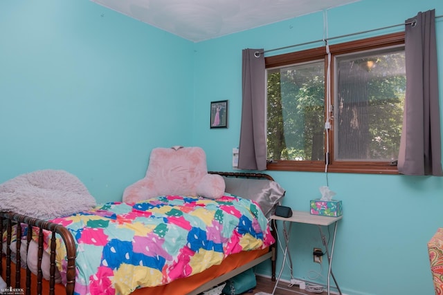 279 Ardelean Dr, Owosso, MI 48867 - bedroom featuring baseboards
