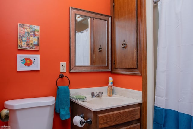279 Ardelean Dr, Owosso, MI 48867 - full bathroom featuring vanity and a shower with shower curtain