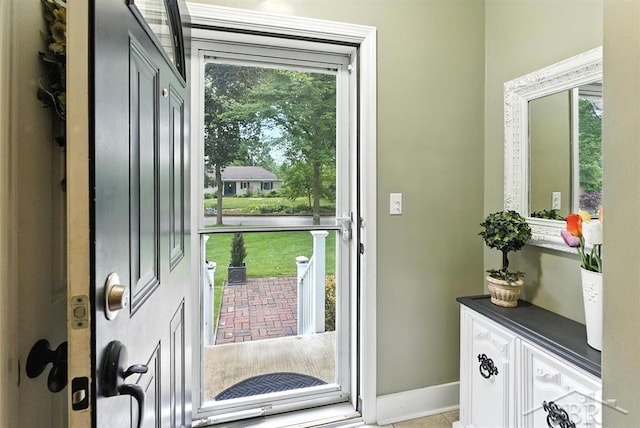 2816 Chippewa Ln, Midland, MI 48640 - doorway to outside with baseboards