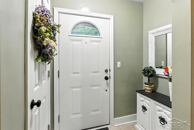 2816 Chippewa Ln, Midland, MI 48640 - entryway featuring light tile patterned flooring and baseboards