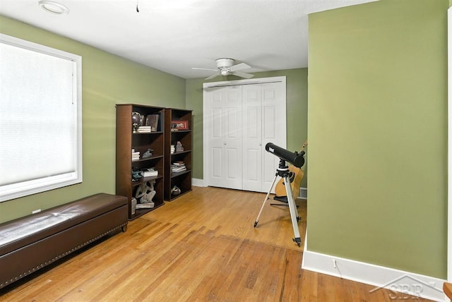 2816 Chippewa Ln, Midland, MI 48640 - exercise area featuring a ceiling fan and wood finished floors