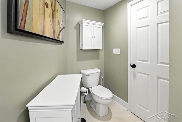 2816 Chippewa Ln, Midland, MI 48640 - half bathroom with toilet and tile patterned flooring