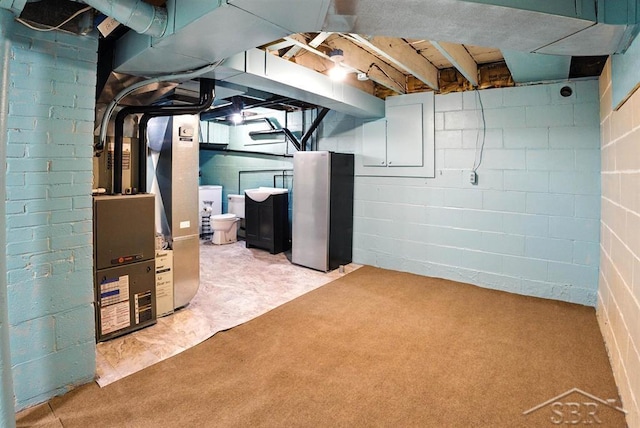 2816 Chippewa Ln, Midland, MI 48640 - basement with freestanding refrigerator and light colored carpet