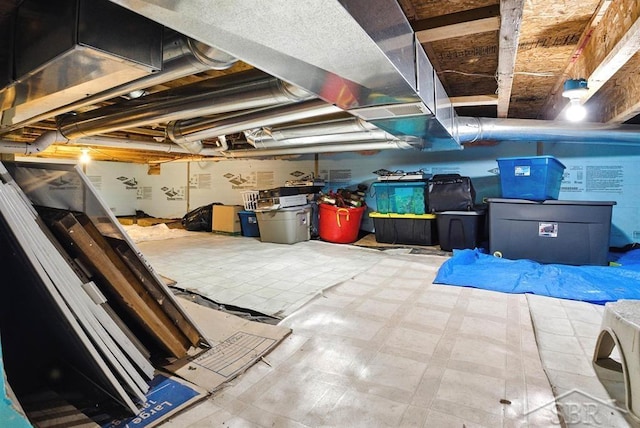 2816 Chippewa Ln, Midland, MI 48640 - unfinished below grade area featuring tile patterned floors
