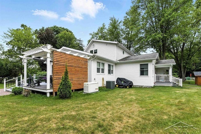 2816 Chippewa Ln, Midland, MI 48640 - back of house with a pergola, a deck, and a yard