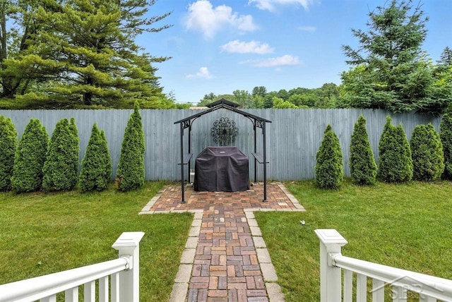 2816 Chippewa Ln, Midland, MI 48640 - fenced backyard featuring a gazebo