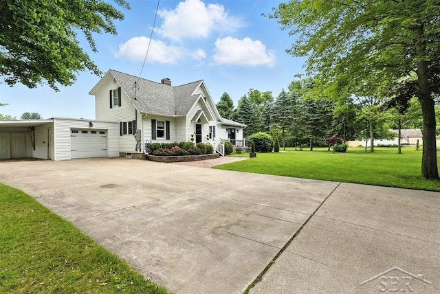 2816 Chippewa Ln, Midland, MI 48640 - view of front of house with a chimney, concrete driveway, a front lawn, and roof with shingles