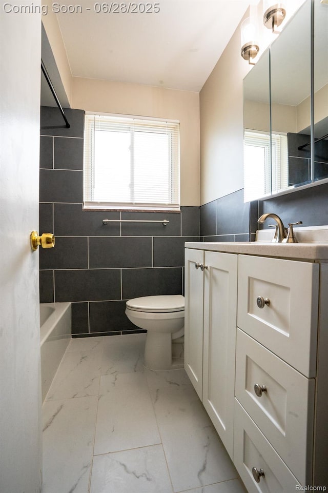 23320 Beechwood Ave, Eastpointe, MI 48021 - full bath featuring vanity, marble look tiles, tile walls, shower / bath combination, and a wainscoted wall