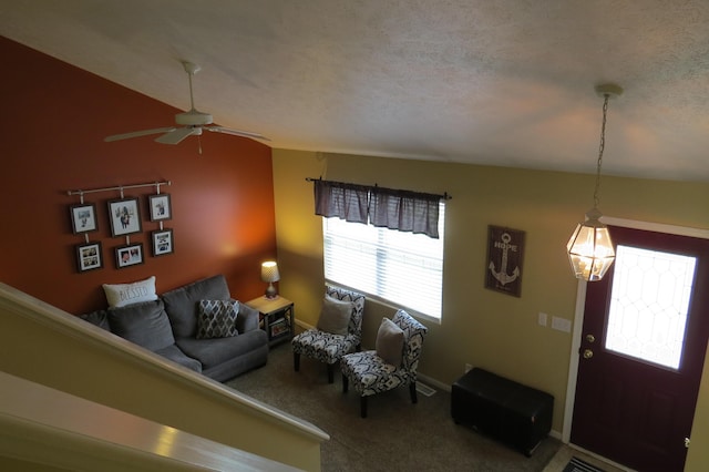3577 Greenly Ct, Holland, MI 49424 - living area with carpet floors and a ceiling fan