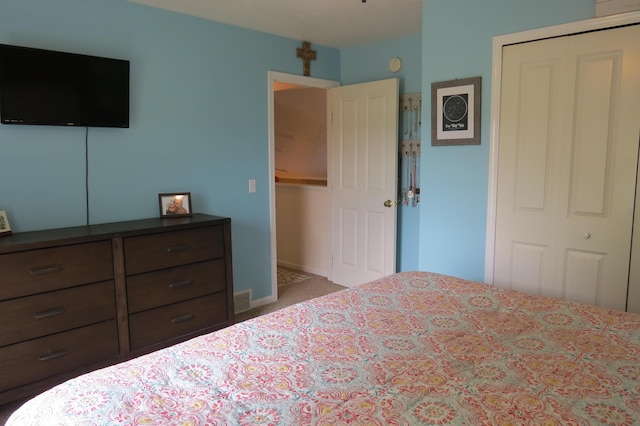 3577 Greenly Ct, Holland, MI 49424 - carpeted bedroom featuring a closet and baseboards
