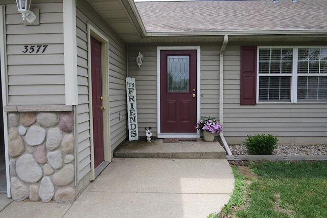 3577 Greenly Ct, Holland, MI 49424 - property entrance featuring a shingled roof