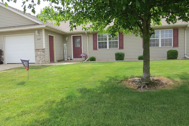3577 Greenly Ct, Holland, MI 49424 - ranch-style home with a garage and a front yard