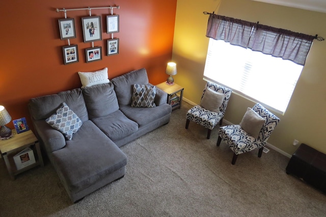 3577 Greenly Ct, Holland, MI 49424 - carpeted living area featuring baseboards