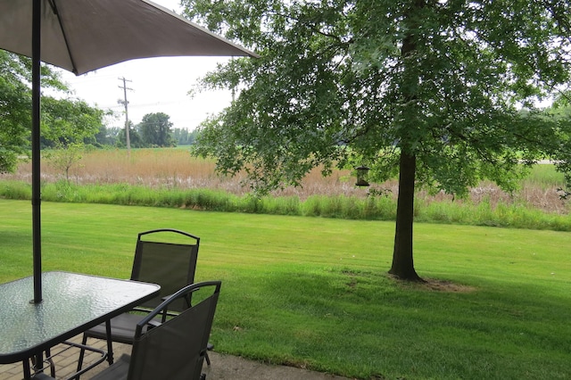 3577 Greenly Ct, Holland, MI 49424 - view of grassy yard featuring outdoor dining space
