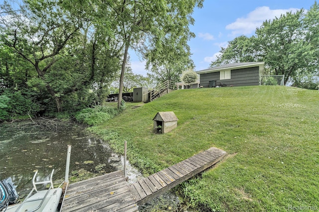 5690 Corunna Ave, Clarkston, MI 48346 - view of grassy yard with a shed