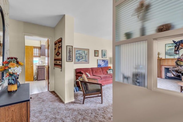 1515 Kensington Dr, Jackson, MI 49203 - living room featuring light carpet and baseboards