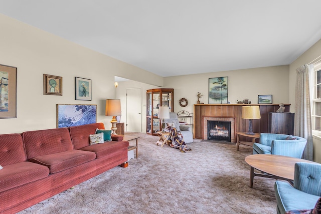 1515 Kensington Dr, Jackson, MI 49203 - carpeted living room with a fireplace with flush hearth