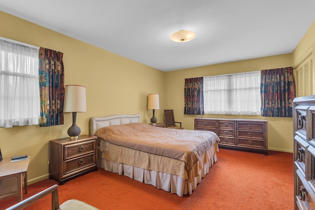 1515 Kensington Dr, Jackson, MI 49203 - bedroom featuring multiple windows and carpet floors