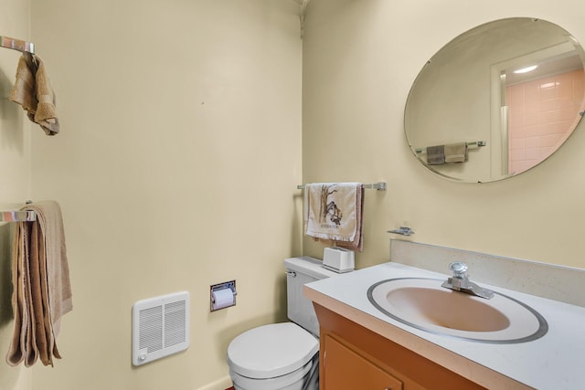 1515 Kensington Dr, Jackson, MI 49203 - bathroom with vanity and heating unit