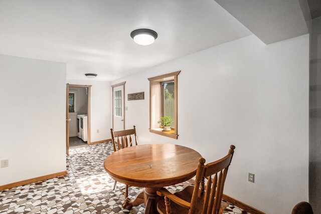 863 E Wilcox Ave, White Cloud, MI 49349 - dining room with baseboards