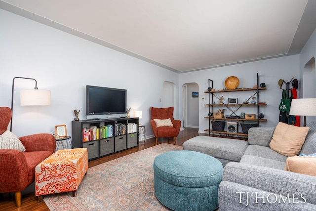 1545 Fuller Ave NE, Grand Rapids, MI 49505 - living area with arched walkways and wood finished floors