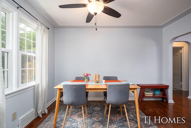 1545 Fuller Ave NE, Grand Rapids, MI 49505 - dining space with arched walkways, wood finished floors, and a ceiling fan