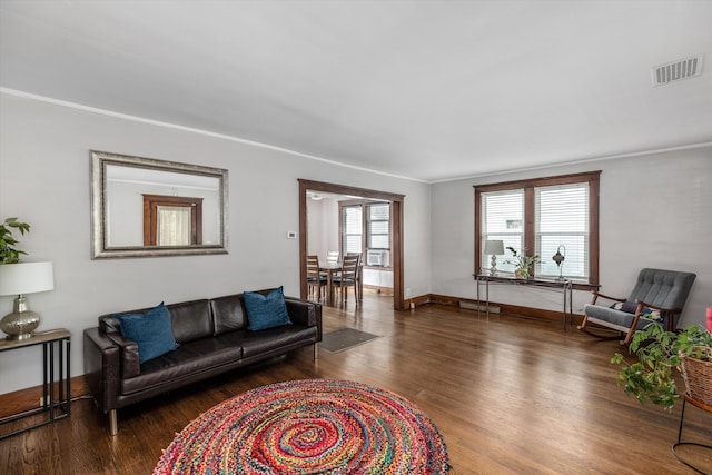 313 Moross Rd, Grosse Pointe Farms, MI 48236 - living area featuring wood finished floors, crown molding, and cooling unit
