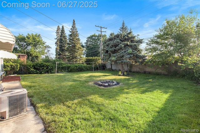 29405 Van Laan Dr, Warren, MI 48092 - fenced backyard with a fire pit