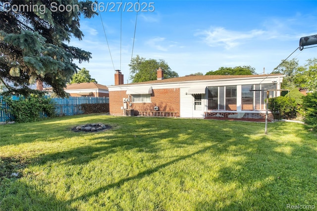 29405 Van Laan Dr, Warren, MI 48092 - rear view of house with a chimney and brick siding