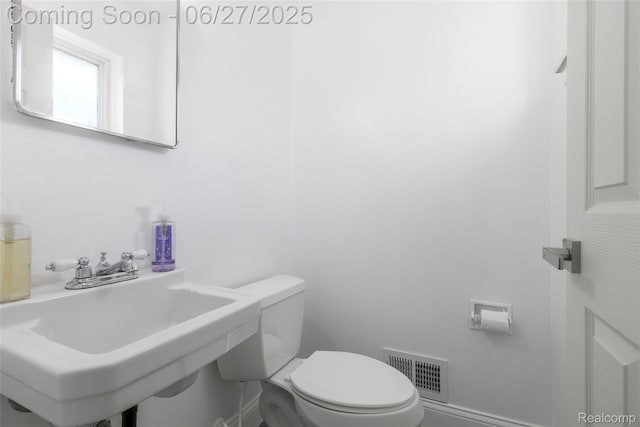 29405 Van Laan Dr, Warren, MI 48092 - half bathroom with a sink and toilet