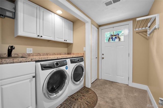 8320 Lagoon St, Commerce Twp, MI 48382 - laundry room with independent washer and dryer, cabinet space, and light carpet