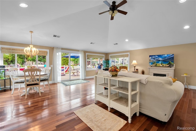 8320 Lagoon St, Commerce Twp, MI 48382 - living room featuring a chandelier, healthy amount of natural light, vaulted ceiling, ceiling fan, and hardwood / wood-style floors