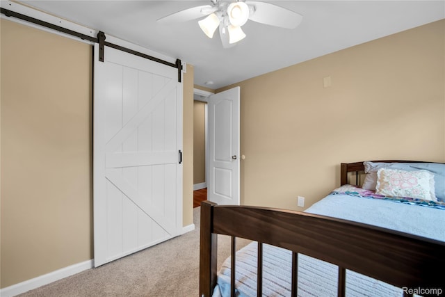 8320 Lagoon St, Commerce Twp, MI 48382 - bedroom with carpet flooring, a barn door, and ceiling fan
