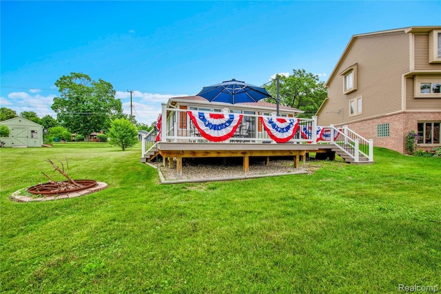 8320 Lagoon St, Commerce Twp, MI 48382 - view of grassy yard featuring a wooden deck and stairs