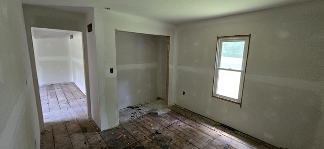 30127 Wells St, Dowagiac, MI 49047 - unfurnished bedroom featuring a closet and multiple windows