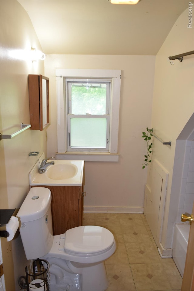 316 W Rankin St, Flint, MI 48505 - full bath featuring vanity, a tub, tile patterned flooring, and lofted ceiling