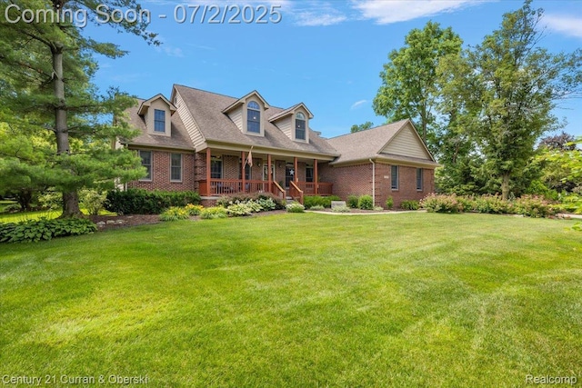 11655 Mcclumpha Rd, Plymouth, MI 48170 - cape cod-style house featuring brick siding, a porch, and a front lawn