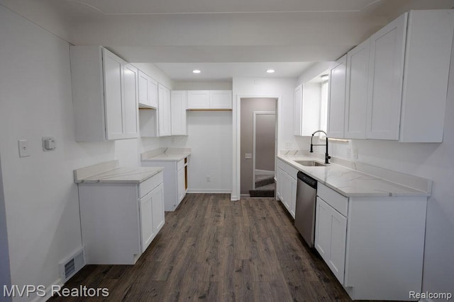 21212 Universal Ave, Eastpointe, MI 48021 - kitchen with stainless steel dishwasher, dark wood-type flooring, white cabinetry, recessed lighting, and light stone countertops
